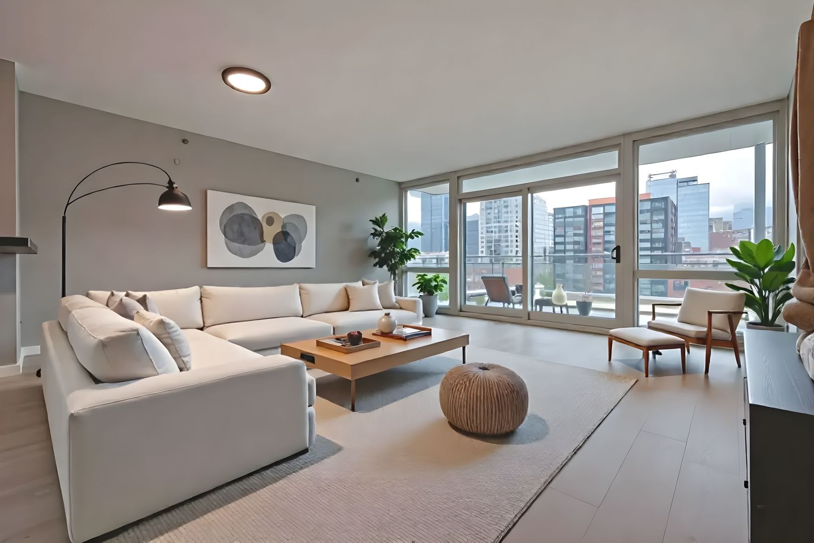 757 North Orleans Street, Unit 1104 Chicago, IL 60654 - Photo 2 of 30 a living room with furniture and a large window