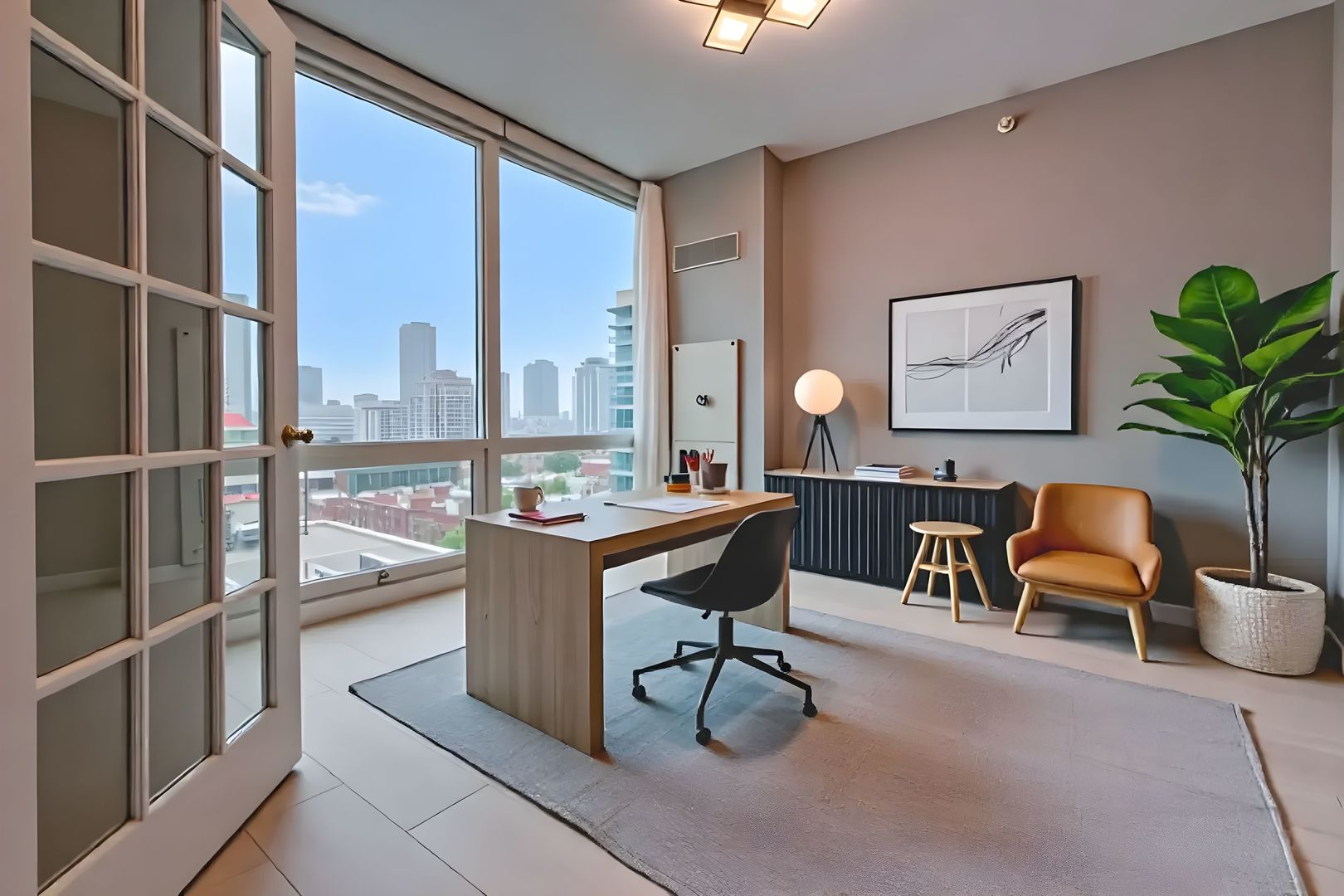 757 North Orleans Street, Unit 1104 Chicago, IL 60654 - Photo 9 of 30 a living room with furniture a table and chairs