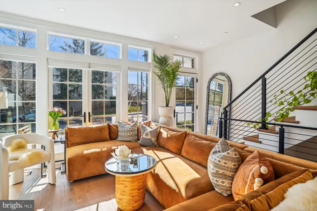 a bed room with furniture and a flat screen tv