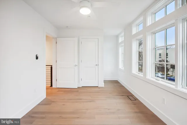a bathroom with a shower curtain and a bath tub