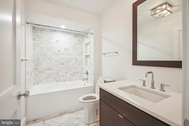 a view of room with stairs and wooden floor