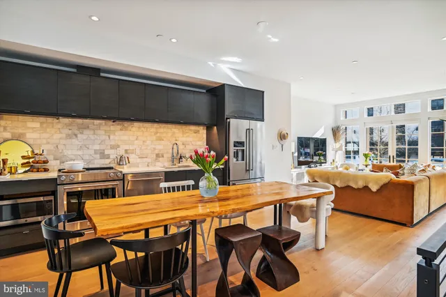 a room with a bed and furniture