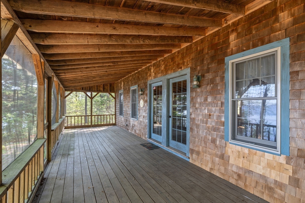 362 Snows Pond Road Rochester, MA 02770 - Photo 26 of 41 a view of outdoor space with wooden floor and windows