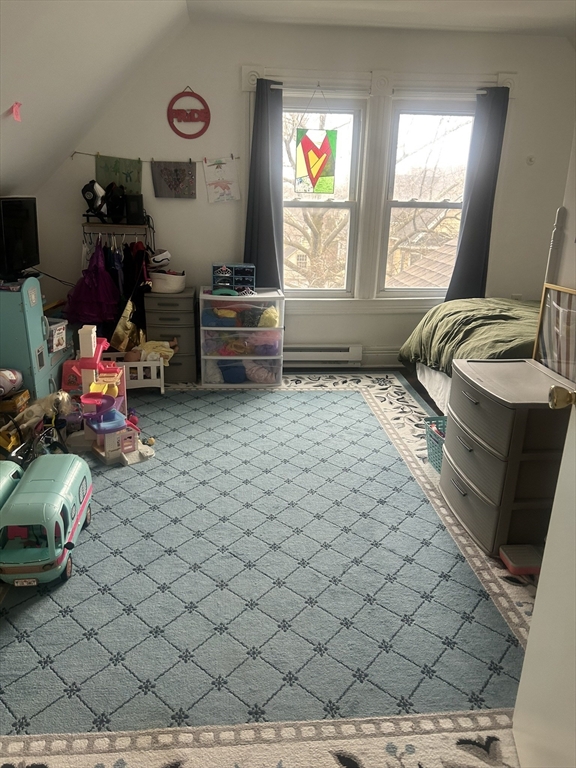 51 Acushnet Avenue Springfield, MA 01105 - Photo 14 of 22 a bedroom with a bed and a window