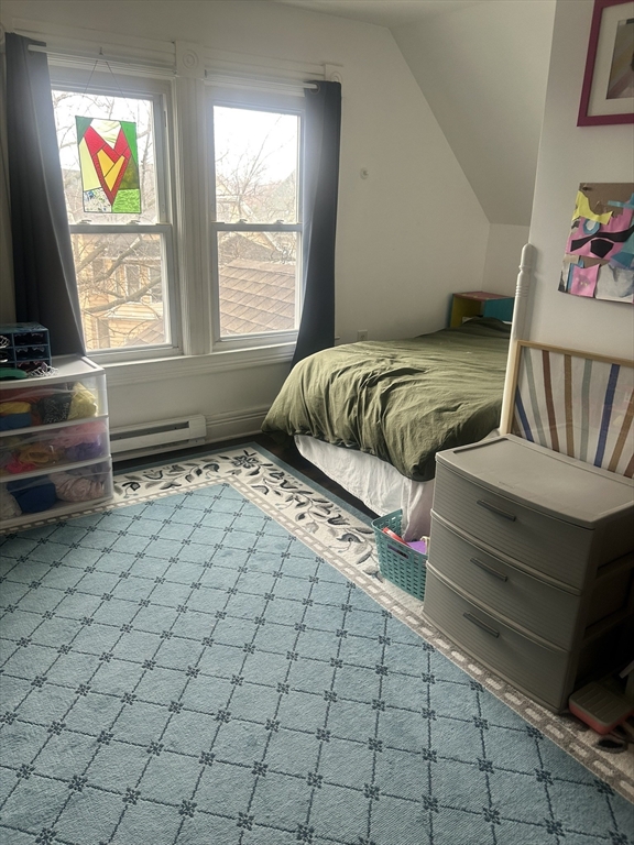 51 Acushnet Avenue Springfield, MA 01105 - Photo 15 of 22 a bedroom with a bed and a window