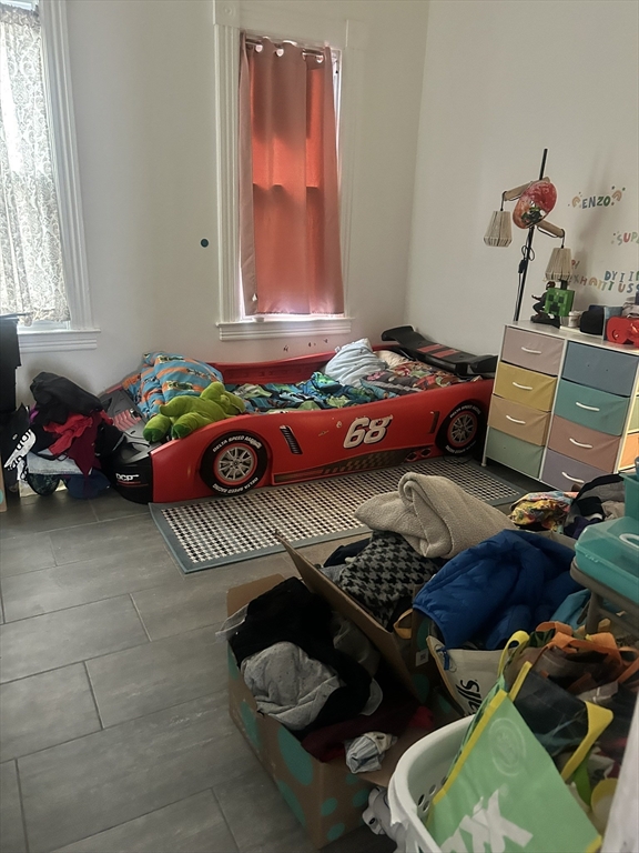51 Acushnet Avenue Springfield, MA 01105 - Photo 16 of 22 a bedroom with bed and a window