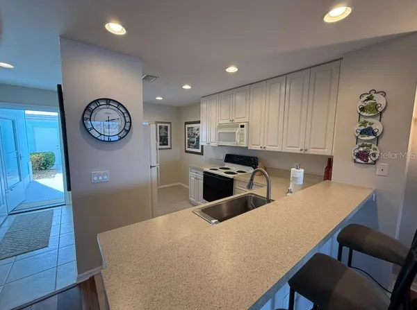 $1,695 | 5748 Sabal Trace Drive, Unit 104B57, North Port, FL 34287