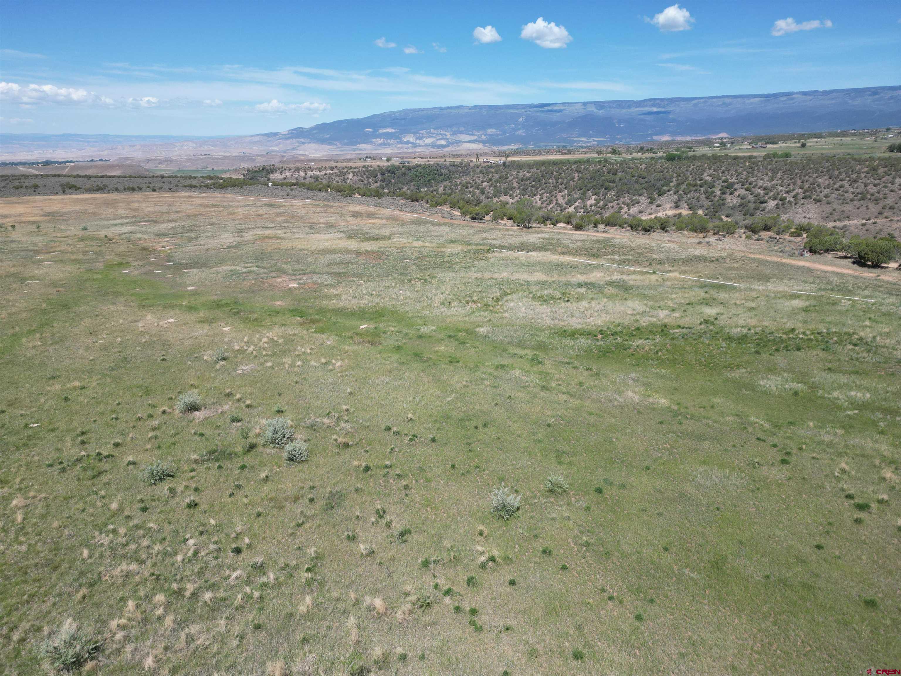 26563 Redlands Mesa Road Hotchkiss, CO 81419 - Photo 2 of 14 a view of an ocean beach