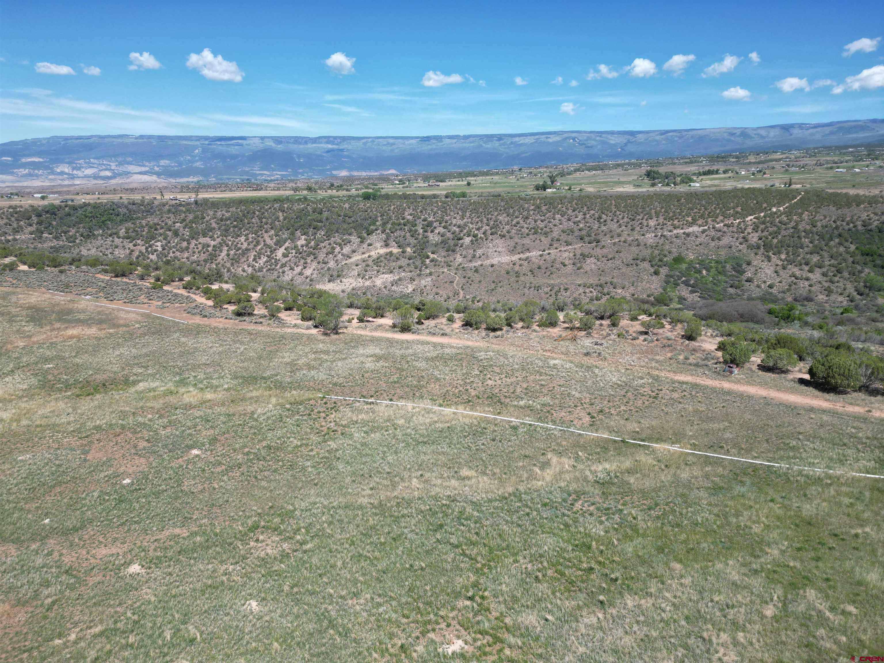 26563 Redlands Mesa Road Hotchkiss, CO 81419 - Photo 5 of 14 a view of an ocean beach