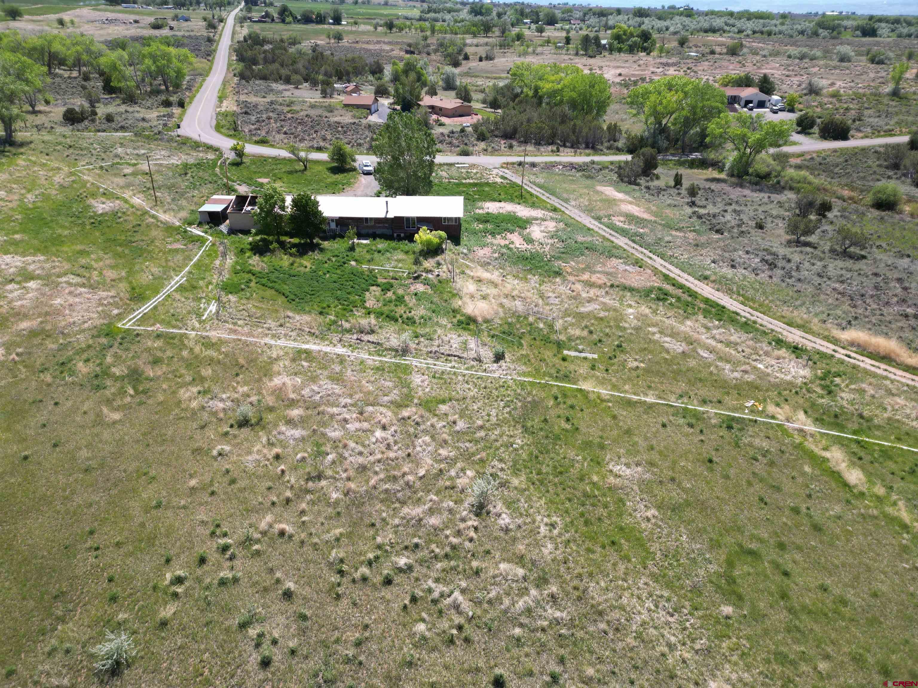 26563 Redlands Mesa Road Hotchkiss, CO 81419 - Photo 6 of 14 an aerial view of residential house with outdoor space