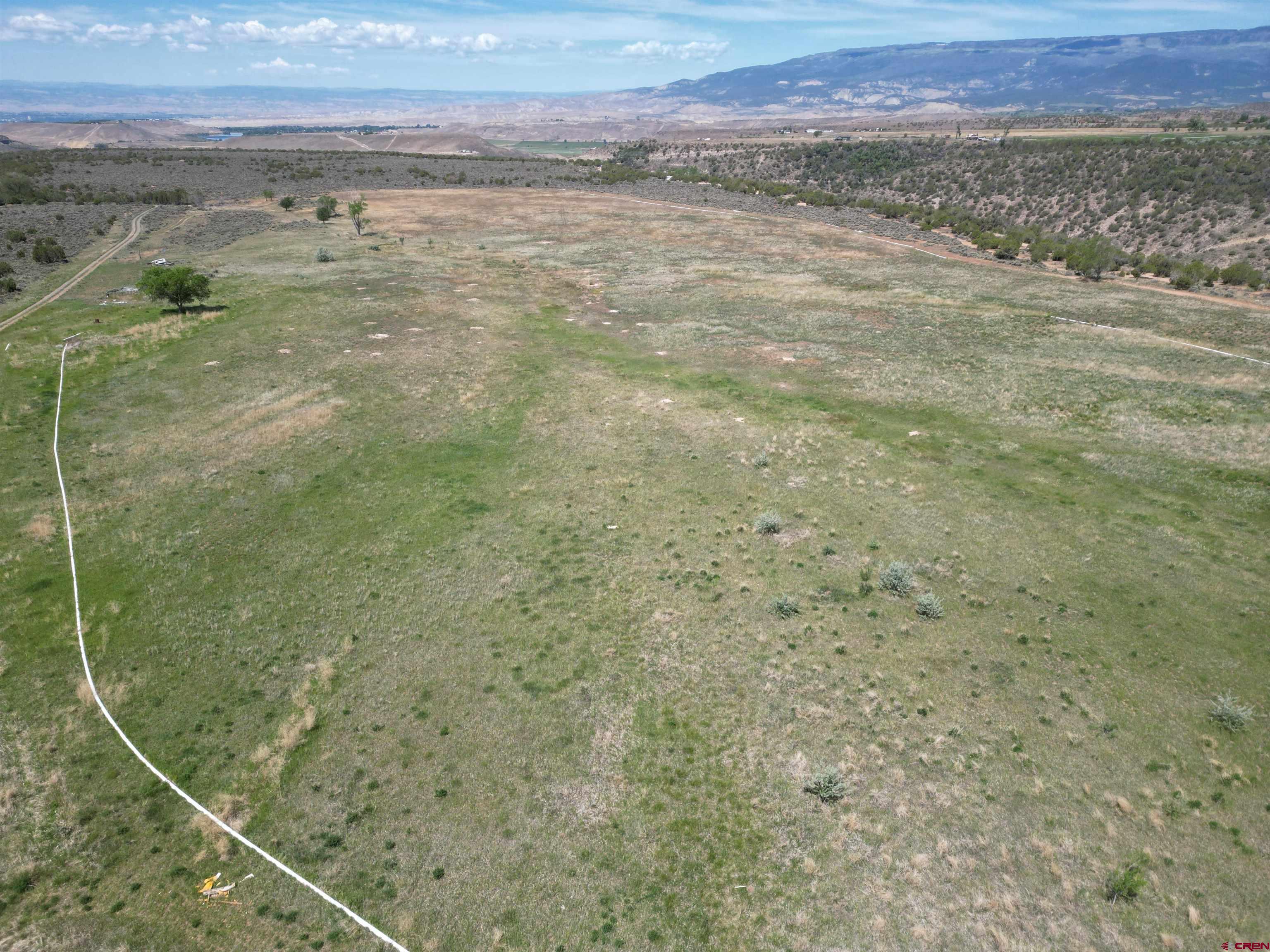 26563 Redlands Mesa Road Hotchkiss, CO 81419 - Photo 7 of 14 a view of a sky from a yard