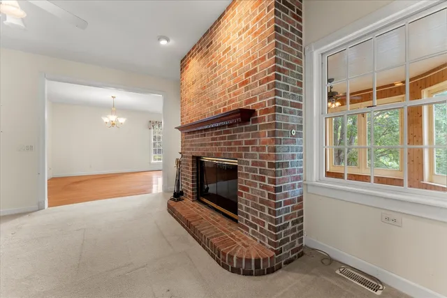 a bathroom with a toilet a sink and a mirror