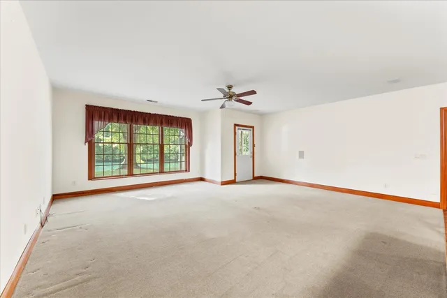 a view of a kitchen with a sink cabinets and a window
