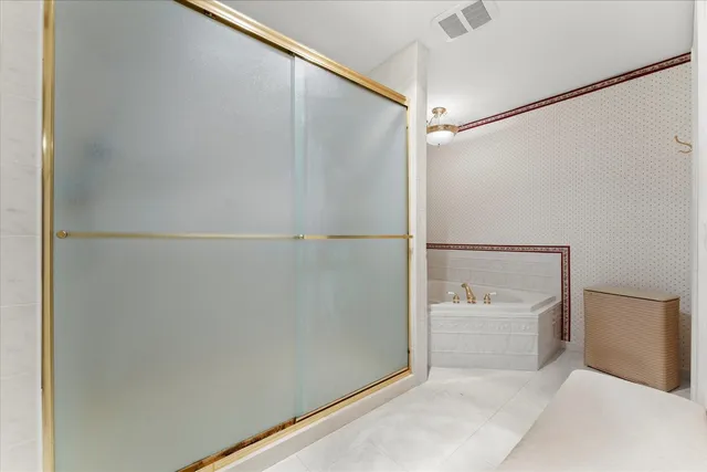 a bathroom with a sink double vanity and a mirror