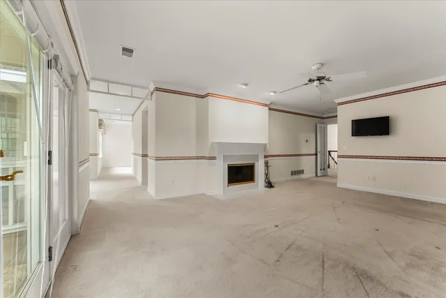 a view of a yard with a tree