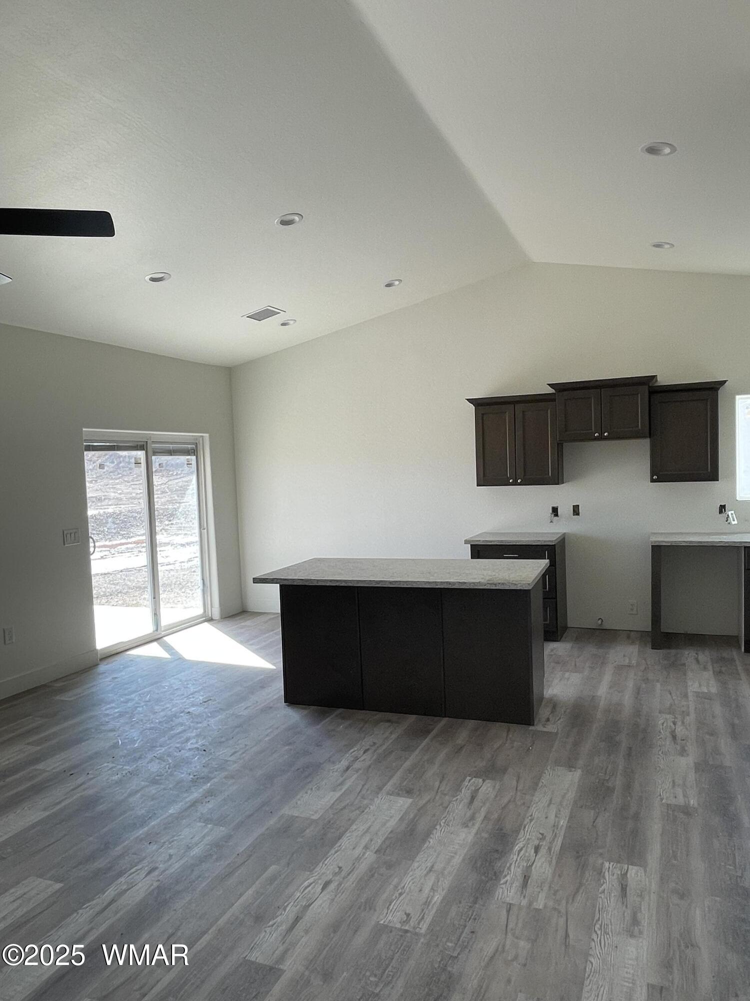 23 South Foothills Boulevard Taylor, AZ 85939 - Photo 15 of 16 a living room with hard wood floors and a wooden floors
