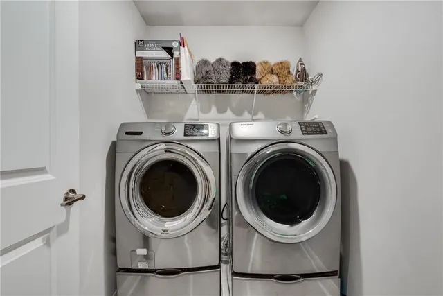 a kitchen with a washer and dryer