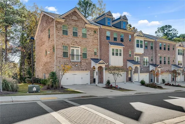 a view of a building along a street