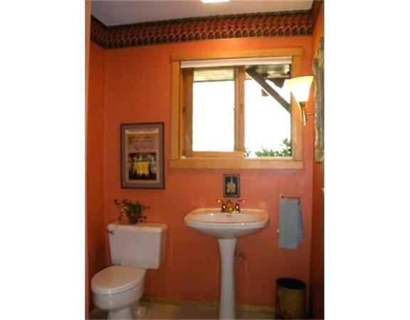 55 Buffam Road Pelham, MA 01002 - Photo 16 of 30 a bathroom with a toilet a sink and mirror
