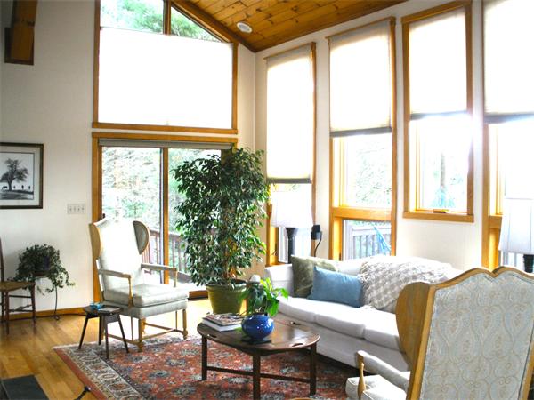 55 Buffam Road Pelham, MA 01002 - Photo 10 of 30 a living room with furniture and a large window