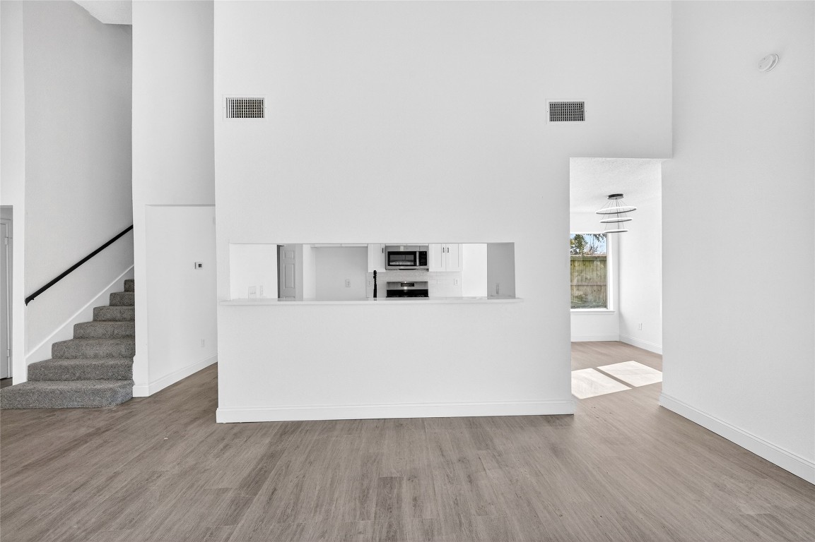 24007 Landing Way Drive Spring, TX 77373 - Photo 11 of 44 a view of kitchen and wooden floor