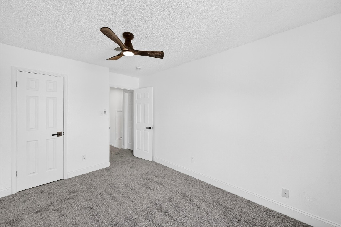 24007 Landing Way Drive Spring, TX 77373 - Photo 34 of 44 a view of empty room with ceiling fan