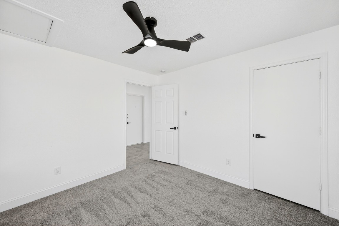 24007 Landing Way Drive Spring, TX 77373 - Photo 36 of 44 a view of a livingroom with a ceiling fan & a ceiling fan