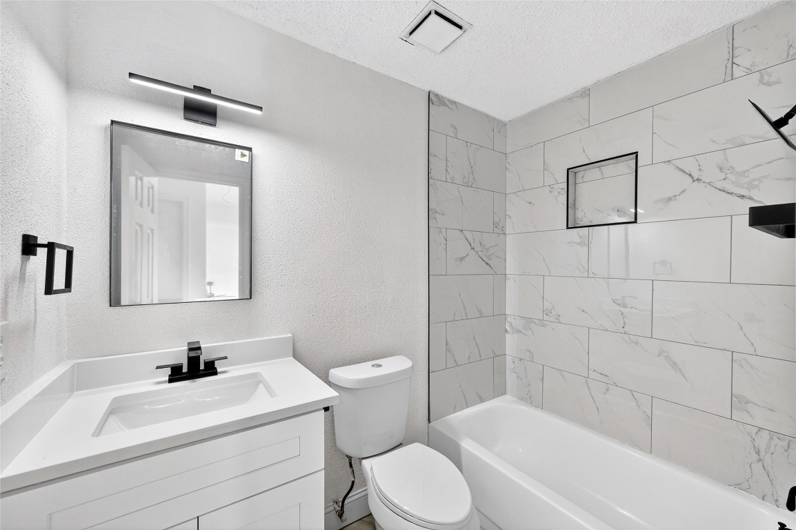 24007 Landing Way Drive Spring, TX 77373 - Photo 38 of 44 a bathroom with a sink toilet and shower