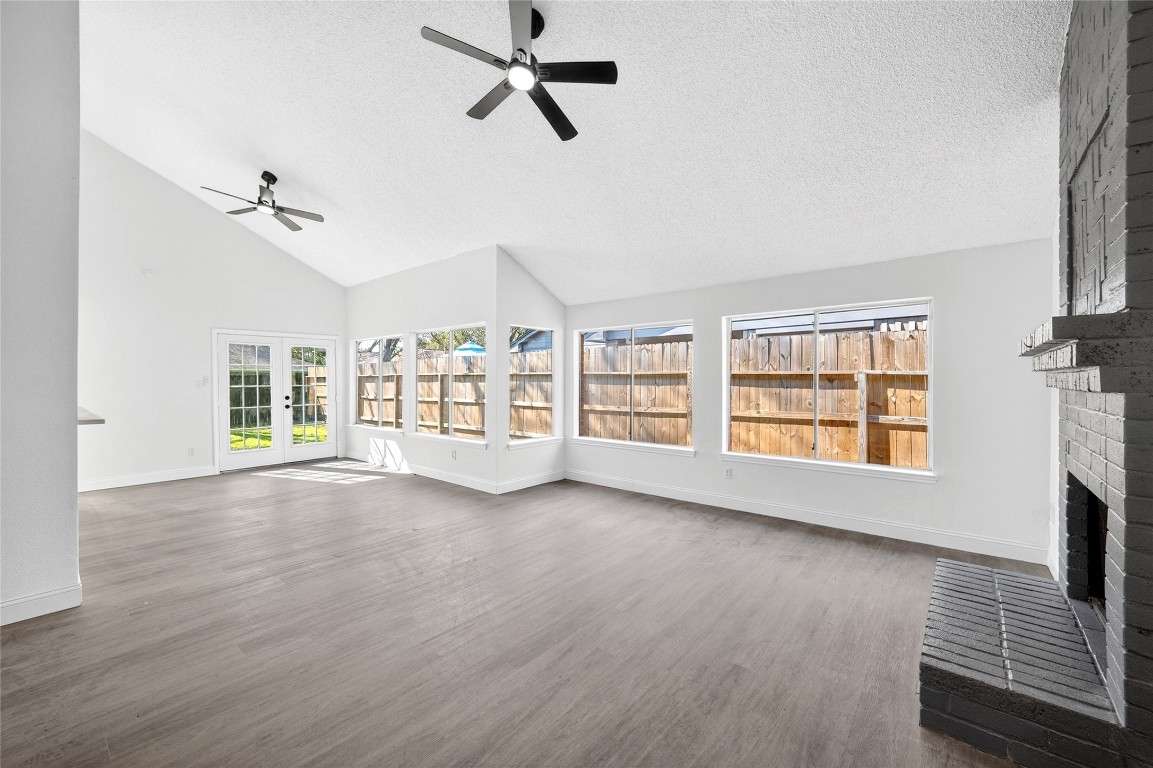 24007 Landing Way Drive Spring, TX 77373 - Photo 10 of 44 a view of an empty room with a window and wooden floor