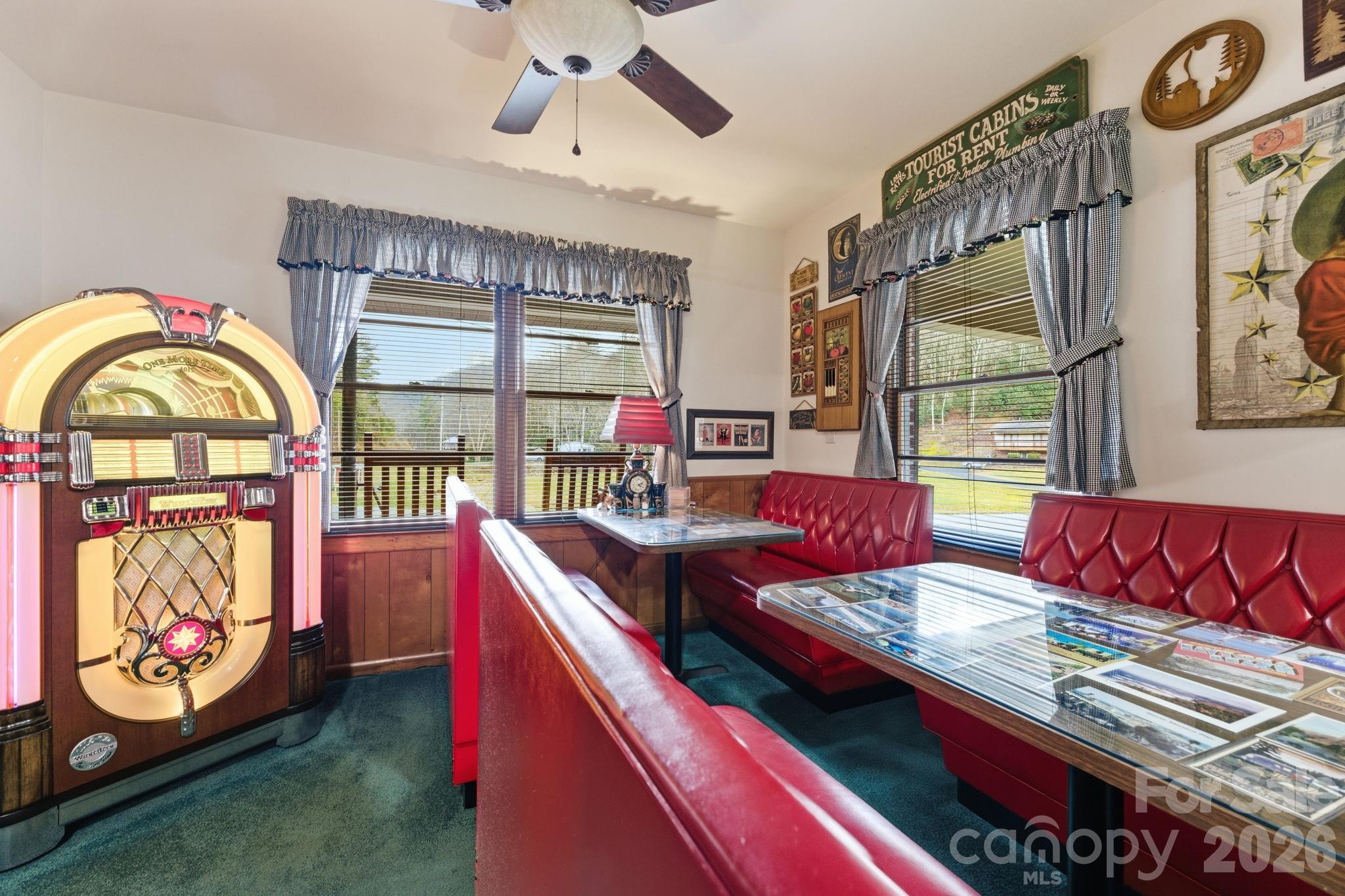 504 Greens Creek Road Sylva, NC 28779 - Photo 15 of 47 a living room with furniture and a window