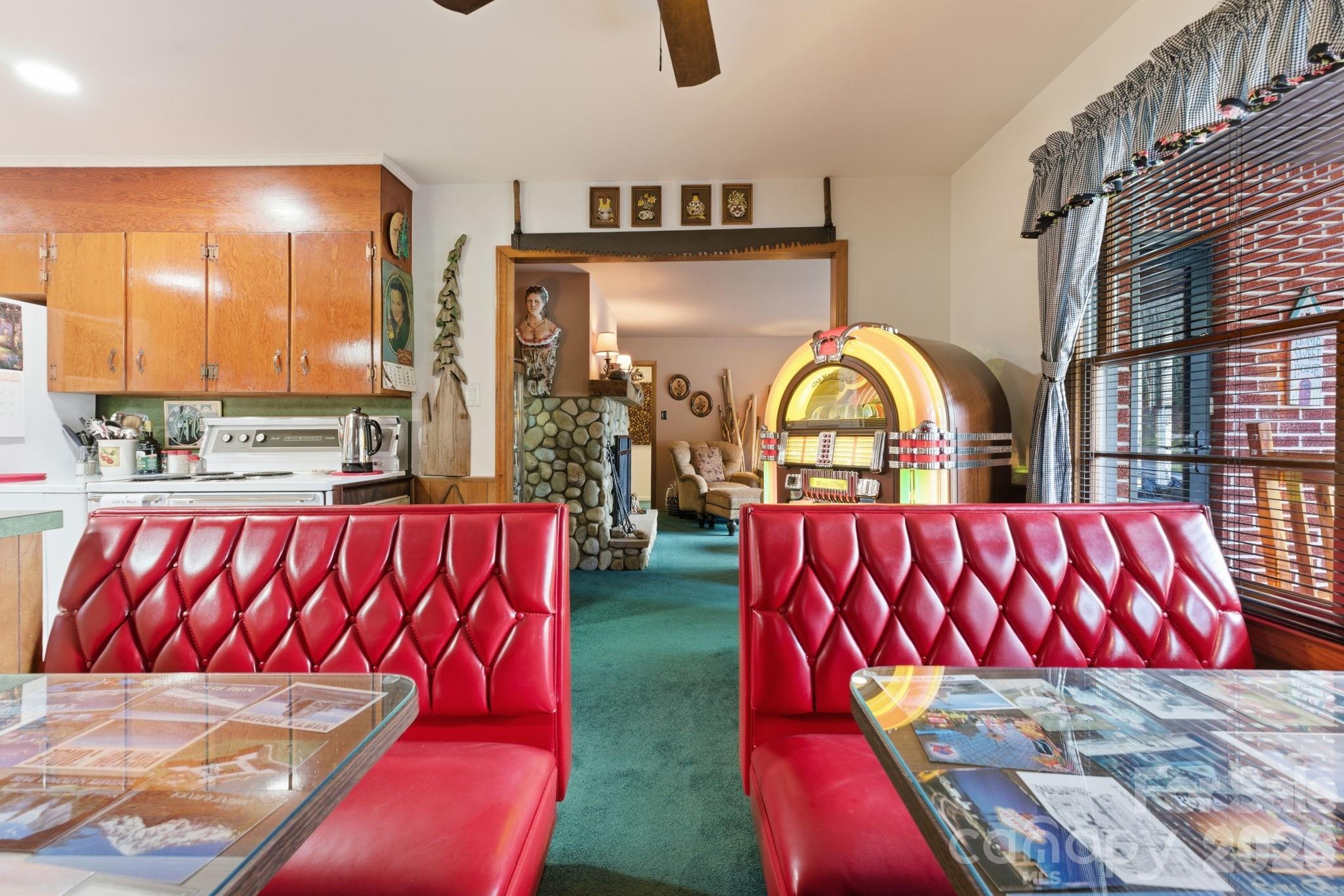 504 Greens Creek Road Sylva, NC 28779 - Photo 16 of 47 a view of a living room and bathroom