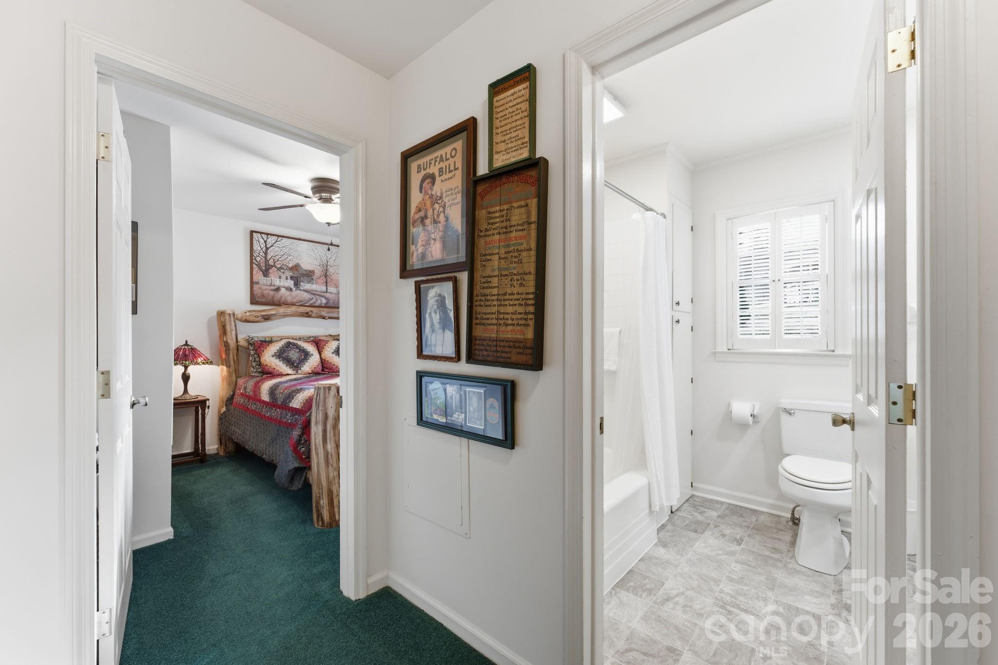 504 Greens Creek Road Sylva, NC 28779 - Photo 28 of 47 a bathroom with a toilet sink and a shower