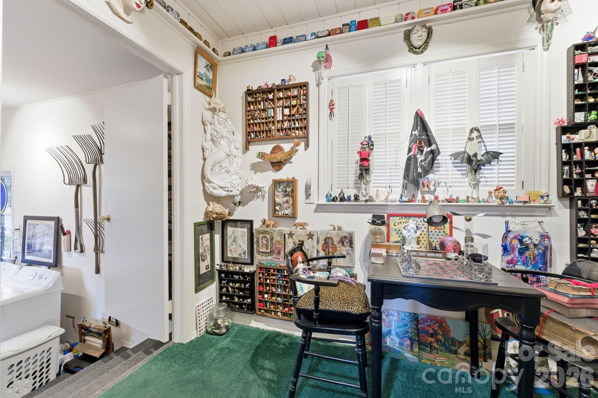 504 Greens Creek Road Sylva, NC 28779 - Photo 34 of 47 a bed room with a bed and a chair