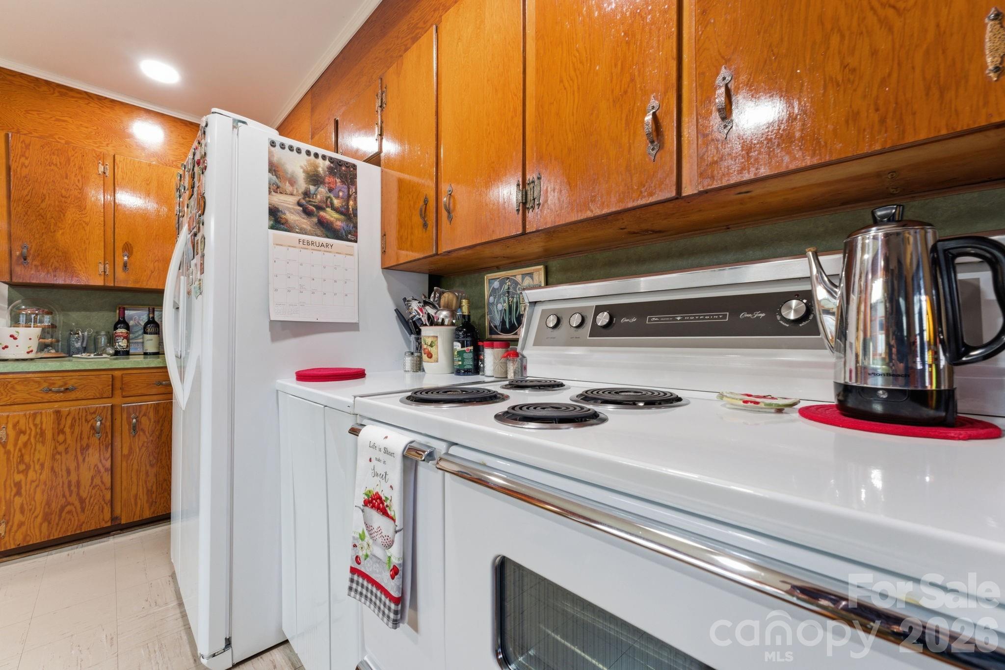 504 Greens Creek Road Sylva, NC 28779 - Photo 9 of 47 a utility room with dryer and washer
