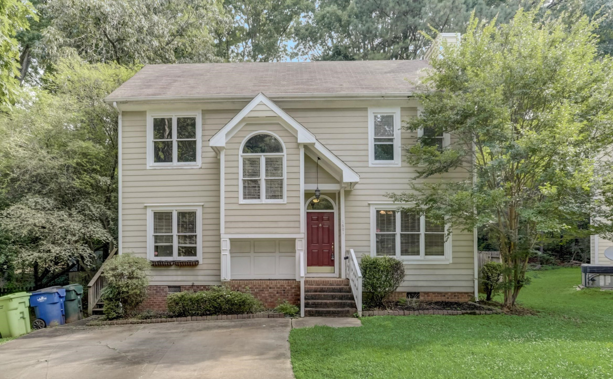 1601 Lethbridge Court Raleigh, NC 27606 - Photo 1 of 17 a view of a house with a yard