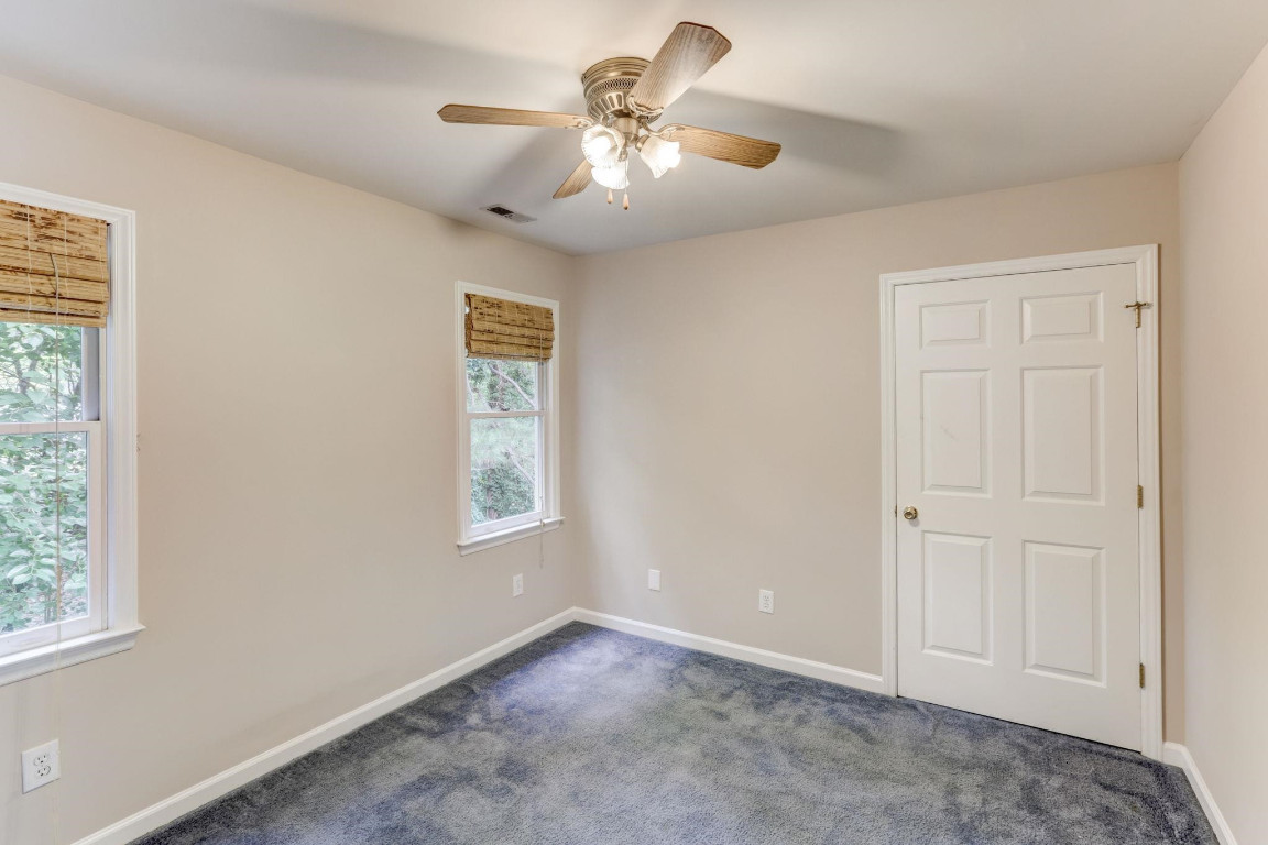 1601 Lethbridge Court Raleigh, NC 27606 - Photo 11 of 17 a view of an empty room with a window