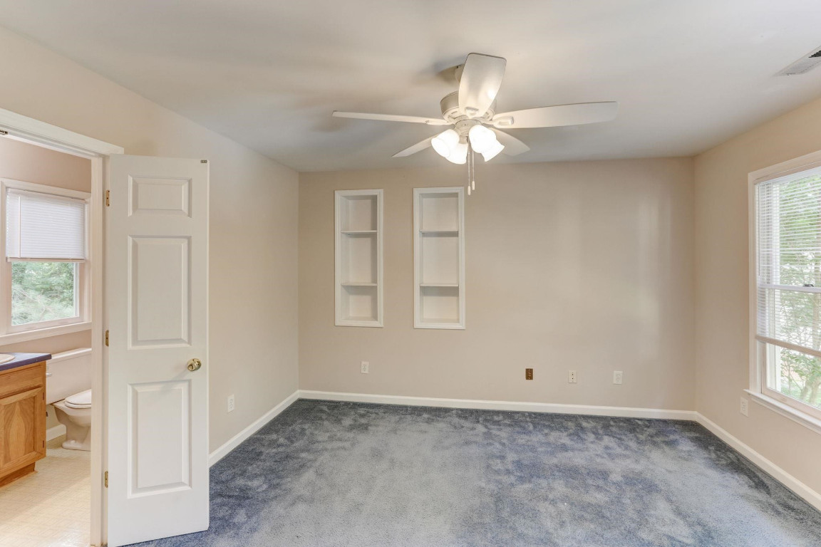 1601 Lethbridge Court Raleigh, NC 27606 - Photo 12 of 17 a view of an empty room with a window