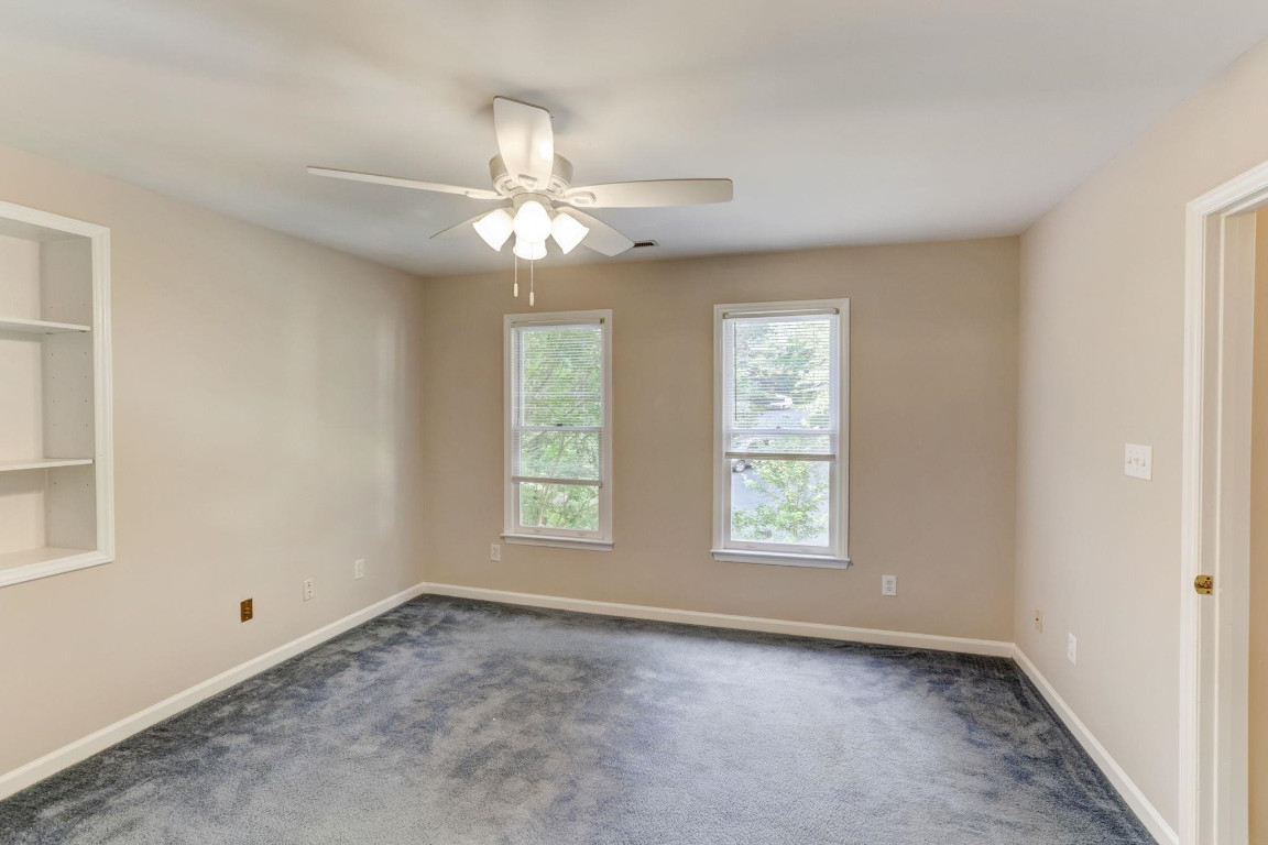 1601 Lethbridge Court Raleigh, NC 27606 - Photo 14 of 17 a view of an empty room with a window