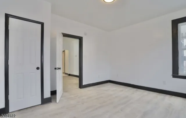 an empty room with a door