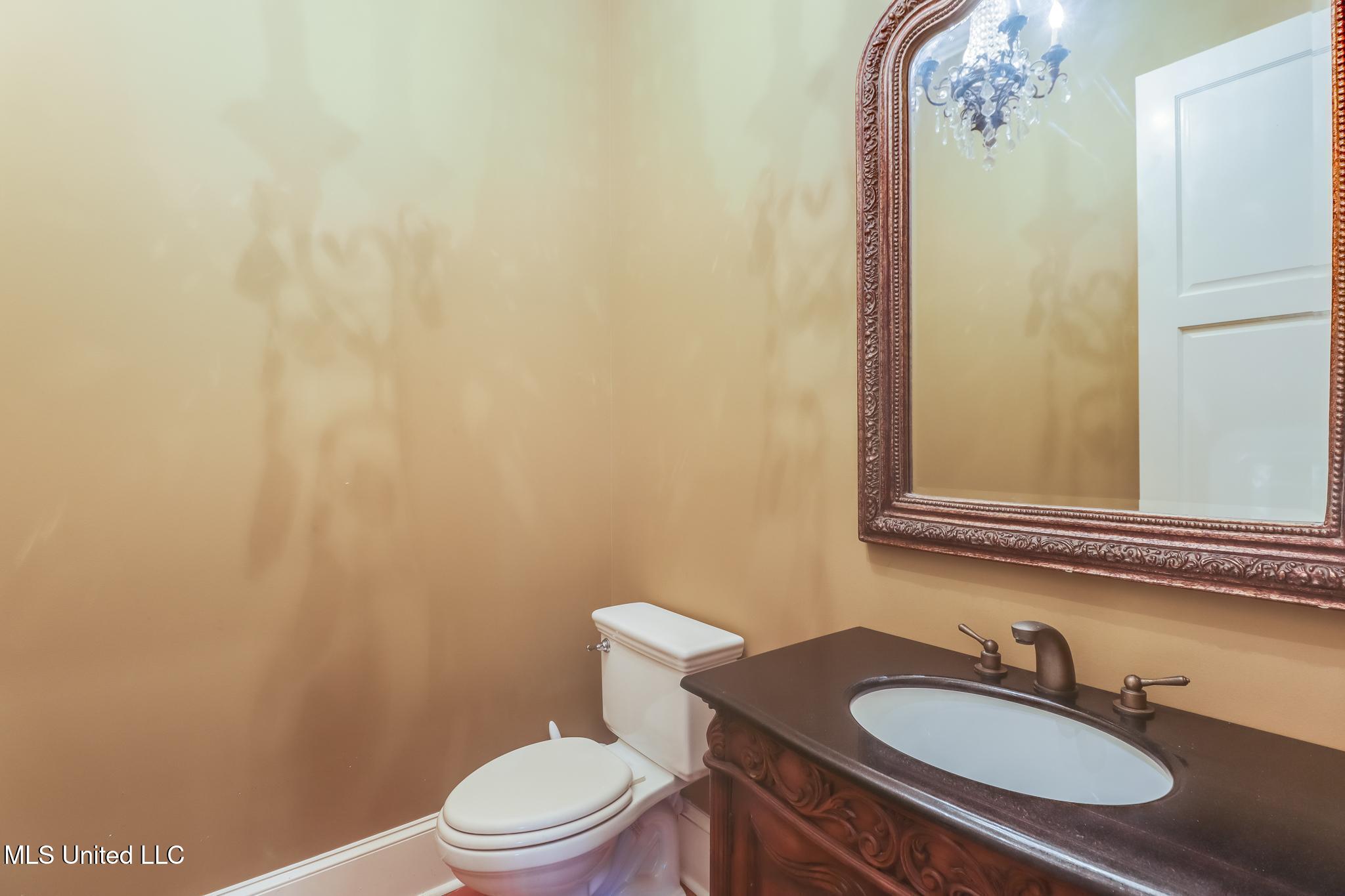 726 Wiggins Circle Pascagoula, MS 39581 - Photo 12 of 54 half bath level 2