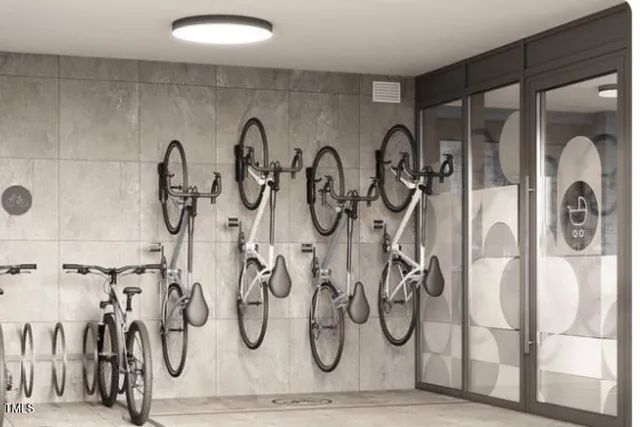 a bathroom with pair of shower