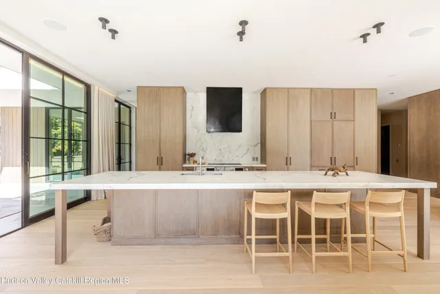 a view of a bathroom from a hallway