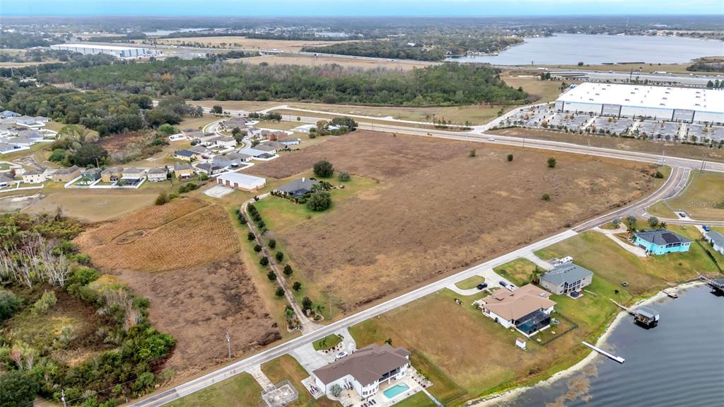 0 Old Berkley Road Auburndale, FL 33823 - Photo 6 of 6 an aerial view of a house with a yard