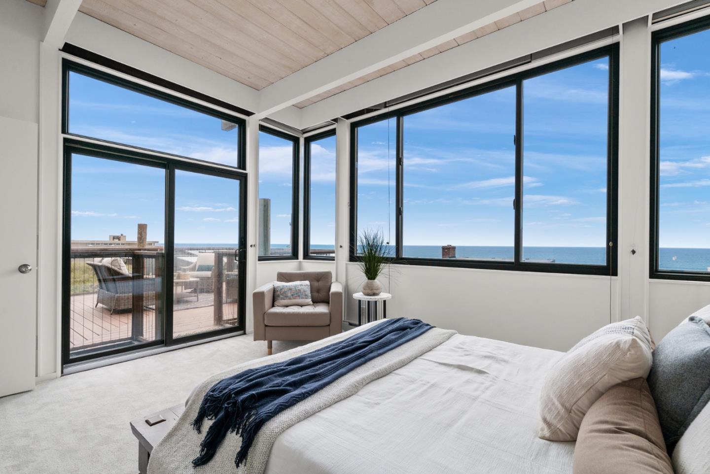 64 Avocet Circle Watsonville, CA 95076 - Photo 48 of 91 a bedroom with a large bed and a large window