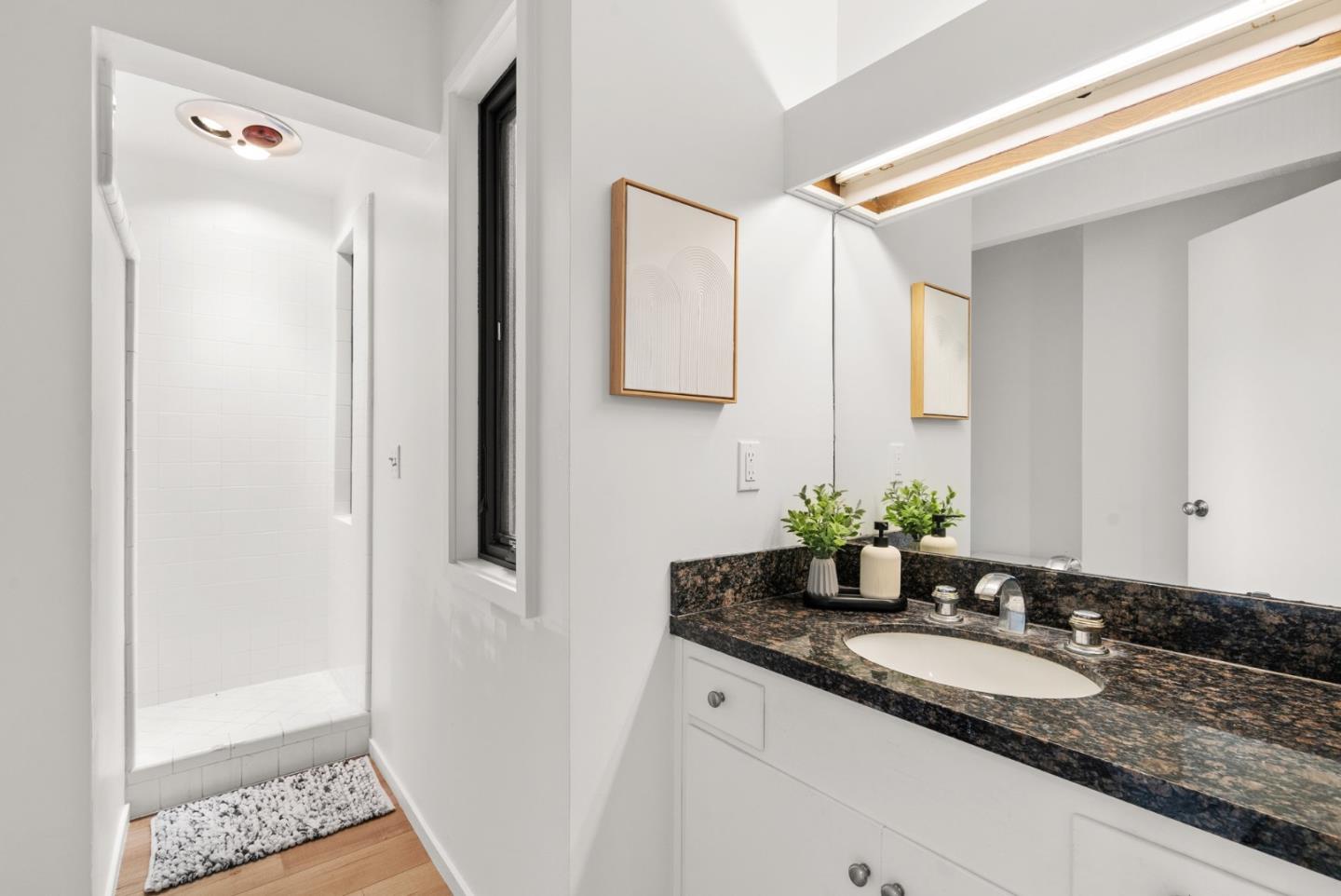 64 Avocet Circle Watsonville, CA 95076 - Photo 56 of 91 a bathroom with a granite countertop sink and a mirror