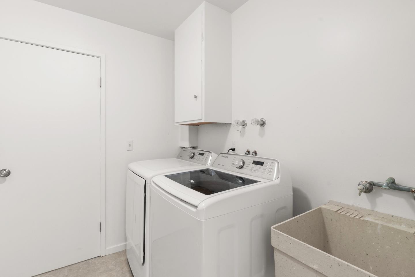 64 Avocet Circle Watsonville, CA 95076 - Photo 70 of 91 a view of washer and dryer sitting on a sink