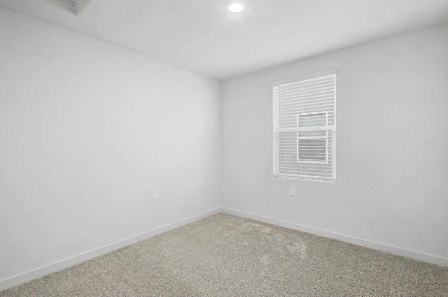 4119 Anise Court Merced, CA 95348 - Photo 15 of 27 an empty room with a window