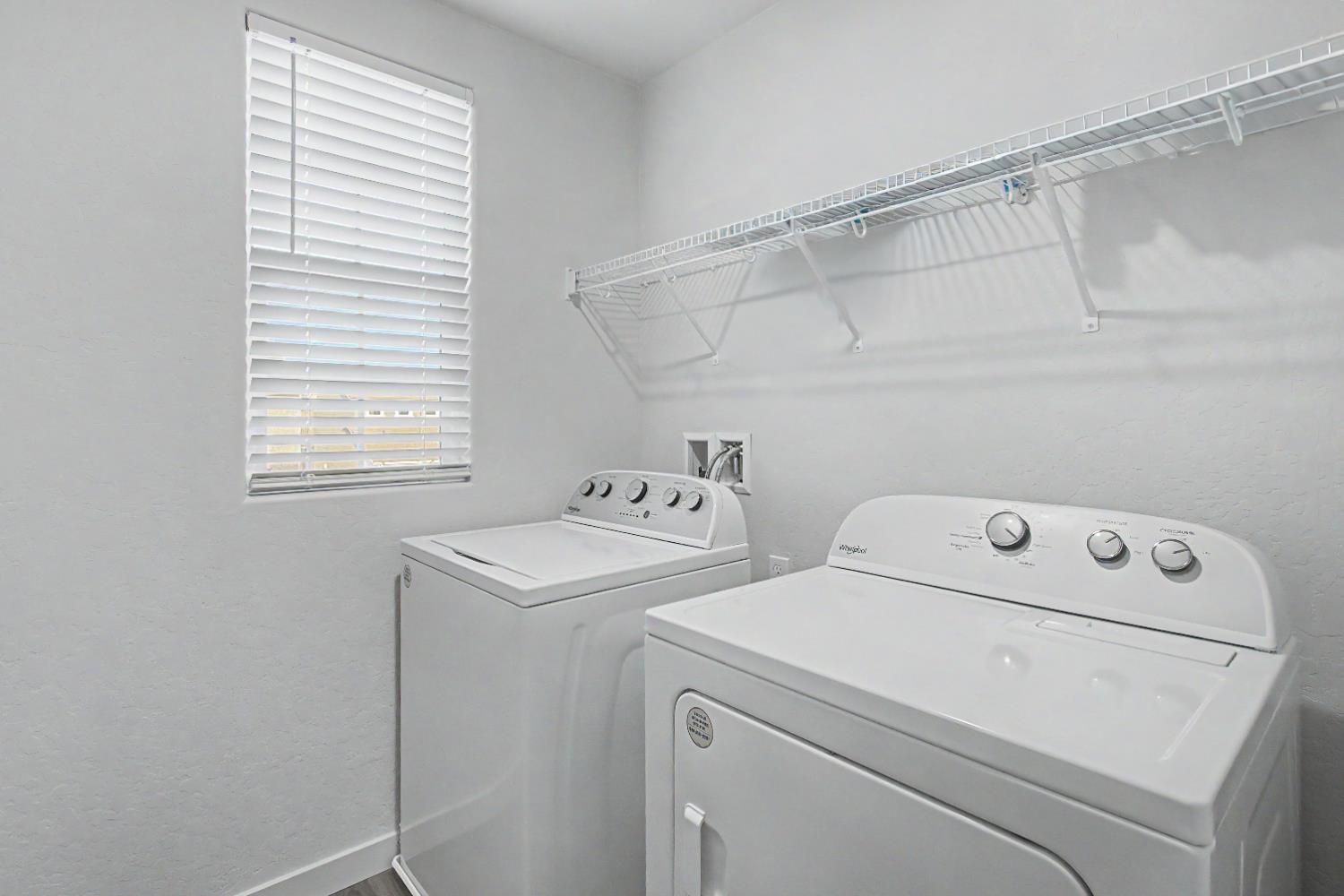 4119 Anise Court Merced, CA 95348 - Photo 19 of 27 a utility room with dryer and washer