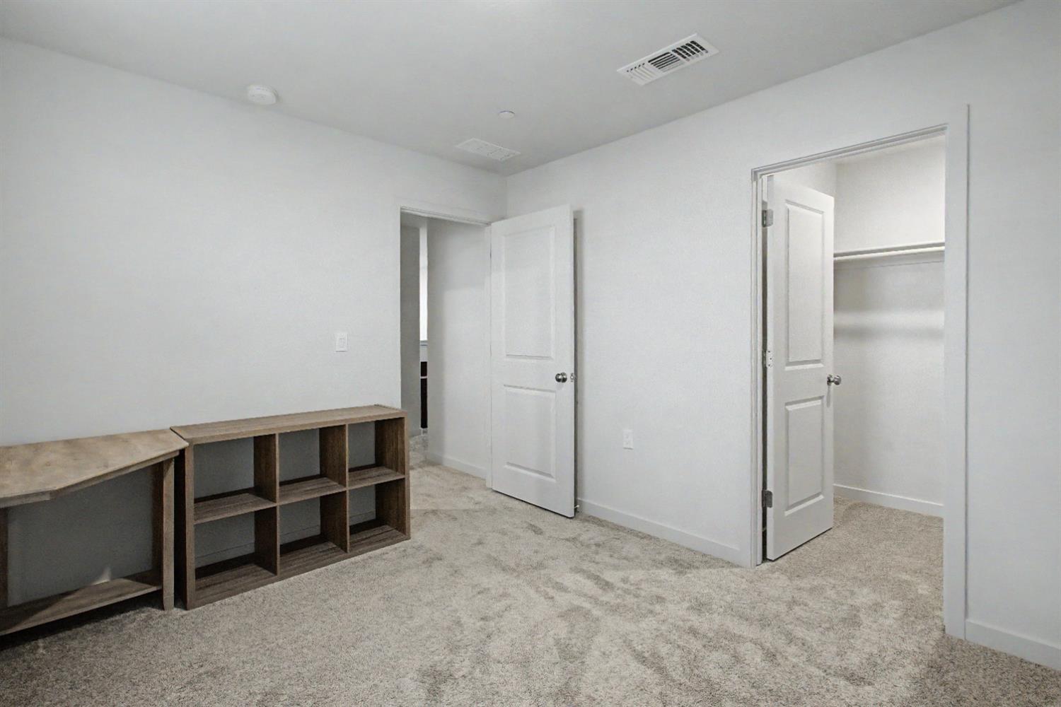 4119 Anise Court Merced, CA 95348 - Photo 20 of 27 a view of an empty room with closet