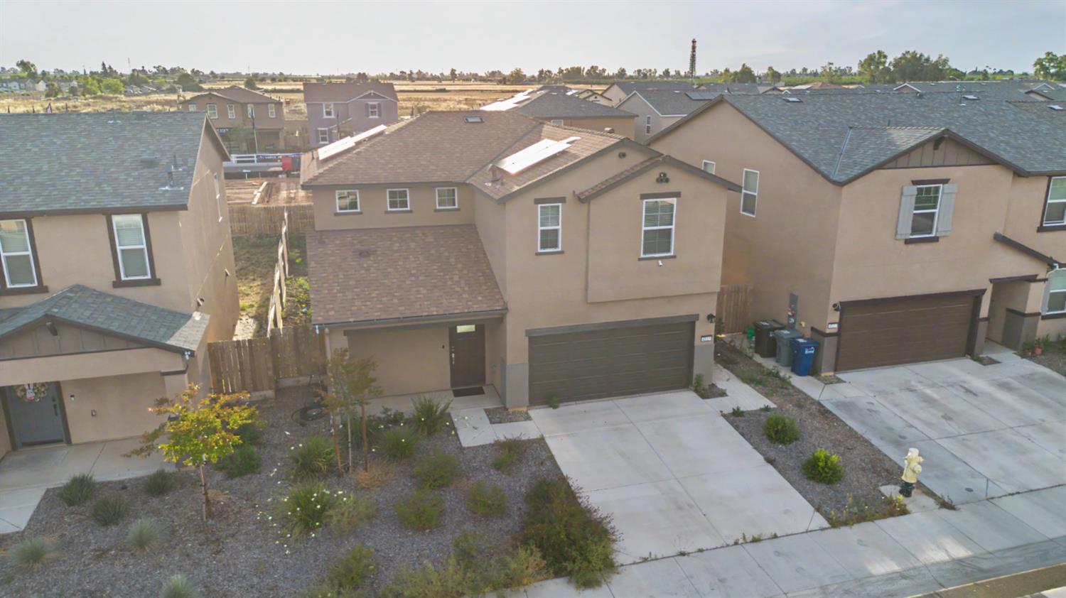 4119 Anise Court Merced, CA 95348 - Photo 2 of 27 a aerial view of a house